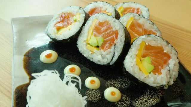 Sushi with salmon, a tasty selection of Japanese Food 