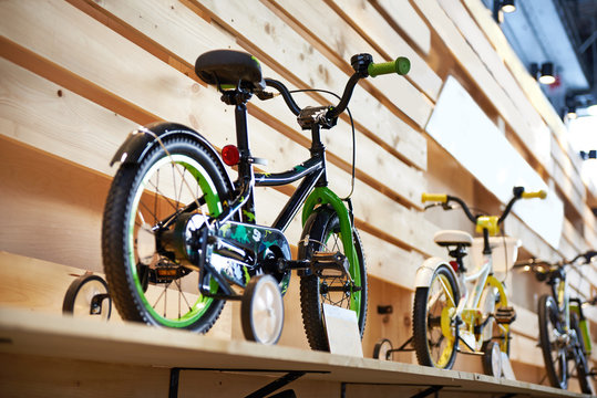 Fototapeta Childrens bicycles in sport shop