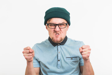 Fototapeta premium portrait of young angry man on white background