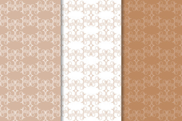 Brown floral backgrounds. Set of seamless patterns