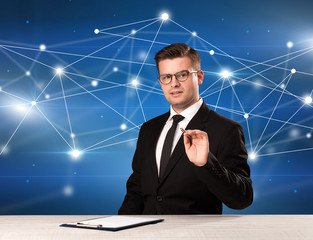 Businessman sitting at a desk