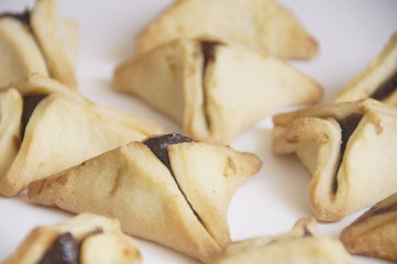 traditional purim triangular pastry stuffed with figs