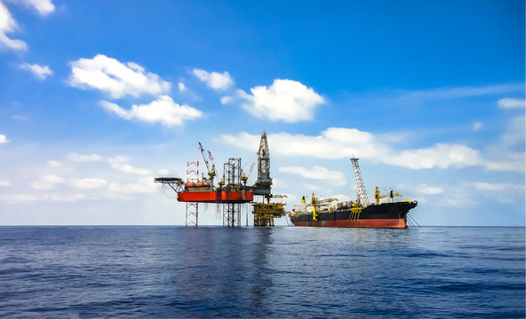 Oil and gas background picture with clear blue sky.