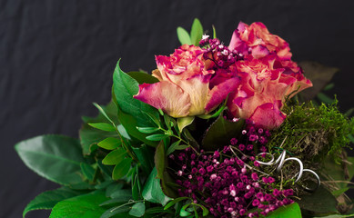 bouquet of flowers on a black background