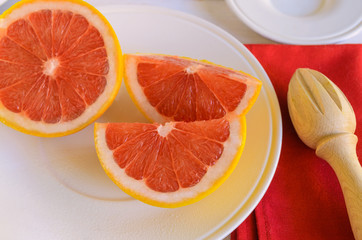 Naklejka na ściany i meble Close up of grapefruit fruit often include in weight loss programs .Healthy fruit background.