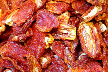 Close-up of a bunch of delicious dried red peppers as background.