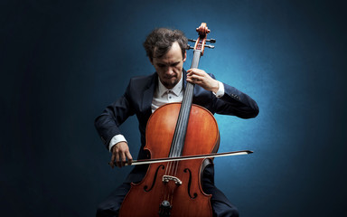 Cellist playing on instrument with empathy