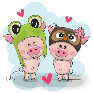 Two Cute Pigs in a frog and owl hat