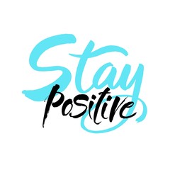 Obraz premium Stay positive inscription. Greeting card with calligraphy. Hand drawn brush lettering design. Isolated vector element