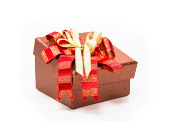 Obraz premium Red gift box placed on white floor.