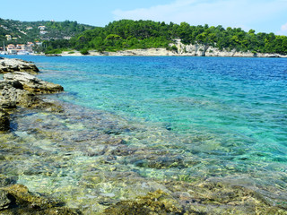 Fototapeta na wymiar Greek rocky coastline, Ionian sea, Paxos, Greece