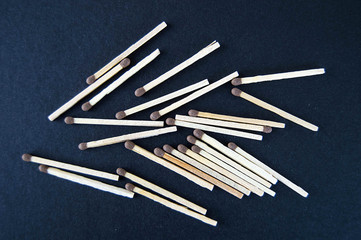 there are dozens of matchsticks and matchboxes standing still,
