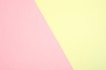 Background of pink and yellow paper in pastel colors