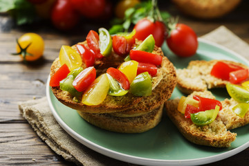 Traditional italian bread frisella with tomatos