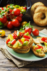 Traditional italian bread frisella with tomatos