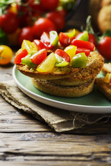 Traditional italian bread frisella with tomatos