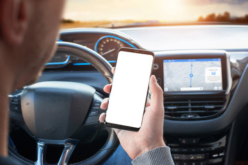 The driver uses the phone while driving. Modern smart phone with round edges. Isolated screen for mockup. Car navigation display in background.