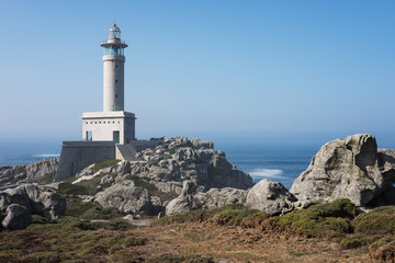 Fototapeta na wymiar Punta Nariga Lighthouse at sunny summer day