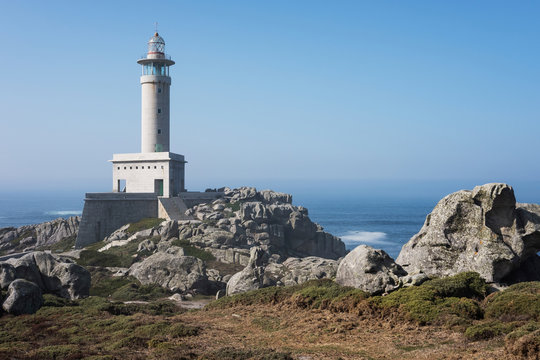 Punta Nariga Lighthouse at sunny summer day