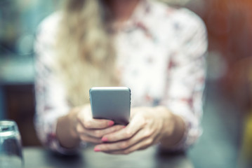 Woman is checking phone message