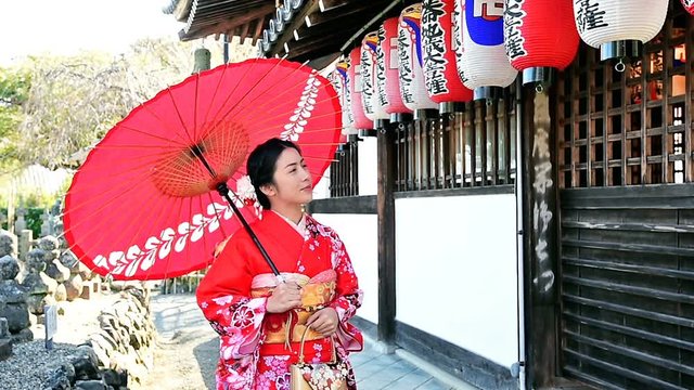 Asian woman wearing japanese traditional kimono  in Kyoto, Japan.