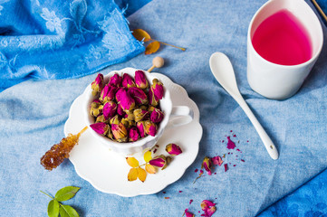 Rose tea buds in a tea cup