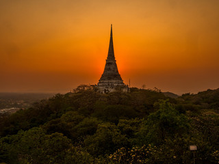 pagoda over the mountain with sunset