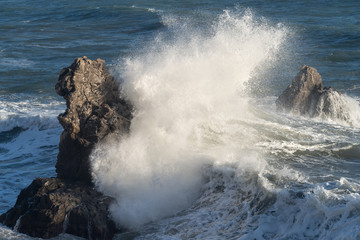 Fototapeta premium Mediterranean sea. Italy. Splashing waves against rocks