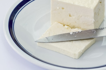 Slice of white cheese