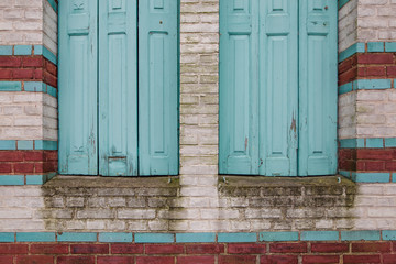 Closed blue shutters.
