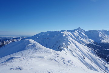 Obraz premium Top of Kopa Kondracka during winter with a view on Kasprowy Wierch, Zakopane, Tatry mountains, Poland