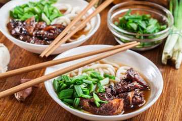 Japanese Udon noodles with beef, green onion and soup