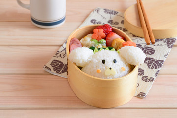 Bento is a single-portion take-out or home-packed meal common in Japanese cuisine. A traditional bento holds rice or noodles, fish or meat, with pickled and cooked vegetables, in a box.