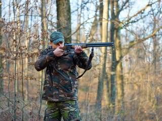 Fototapeta premium Hunter with shotgun