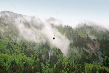 the funicular goes high in the forest mountains