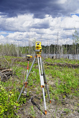 Fototapeta premium Electronic geodetic instruments in the field