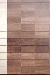 Brown and beige tile wall texture background