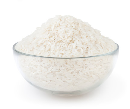 Uncooked white long-grain rice in glass bowl with clipping path