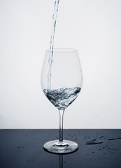 water splashing from glass isolated on white background