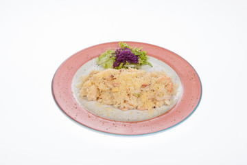 mediterranean food, dish of seafood stew covered with parmesan cheese