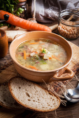 Pea soup with vegetables and bacon.