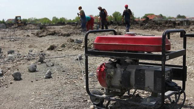 Portable fuel generator for electric power supplies at construction site.
Gasoline powered portable generator give electric current for two jackhammers.
