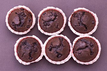 Chocolate capcake on the table.