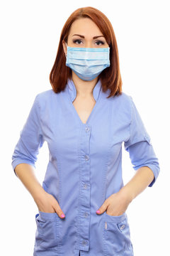 Doctor, Nurse In A Medical Mask Isolated White Background.