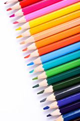 Colorful pencils pattern isolated on white background. Top view colorful of color pencils.Colored pencils, isolated on the white background. Color pencil with copy space isolated on white background,