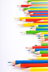  Colorful pencils pattern isolated on white background. Top view colorful of color pencils.Colored pencils, isolated on the white background. Color pencil with copy space isolated on white background,