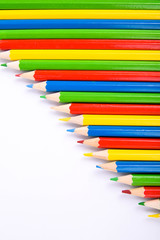  Colorful pencils pattern isolated on white background. Top view colorful of color pencils.Colored pencils, isolated on the white background. Color pencil with copy space isolated on white background,