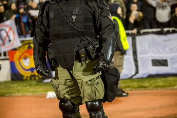 Special police unit at the stadium event secure a safe match against the hooligans