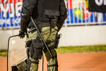 Special police unit at the stadium event secure a safe match against the hooligans