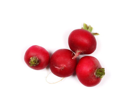 Fresh red radishes isolated on white background, top view